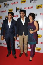 Naga Chaitanya, Nagarjuna and Amala on the Red Carpet of _60the Idea Filmfare Awards 2012(South)..jpg